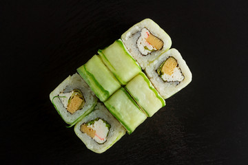 Japanese food: Set of salmon sushi and rolls with salmon and eel