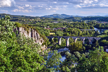 Stone, Railway viaduct over the River Ardeche in France.