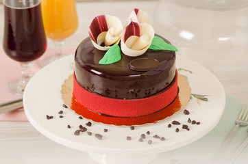 Birthday cake decorated with colorful sauce