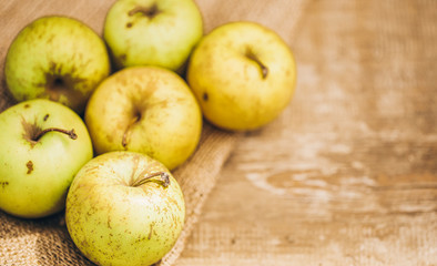 apples on wooden table
