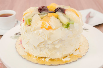 Birthday cake decorated with colorful sauce