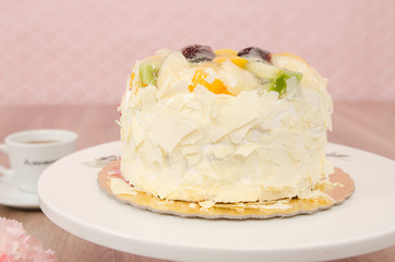 Birthday cake decorated with colorful sauce