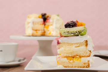 Birthday cake decorated with colorful sauce