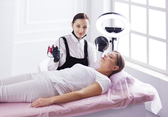 Microblading eyebrows work flow in a beauty salon.