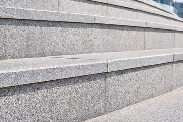 Close-up of stone steps in an urban center.