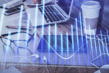 Double exposure of forex chart drawing and cell phone background. Concept of financial trading