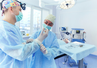 Man surgeon at work in operating room