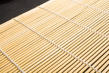 brown bamboo Mat - stand food, close-up, macro