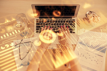 Double exposure of woman hands working on computer and tech theme hologram drawing. Top View. Technology concept.