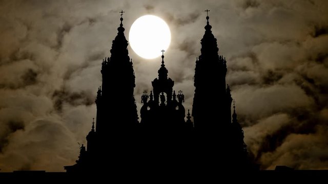 Santiago de Compostela: Time Lapse by Night with Full Moon, Cathedral in Silhouette in Dark Atmosphere, Spain