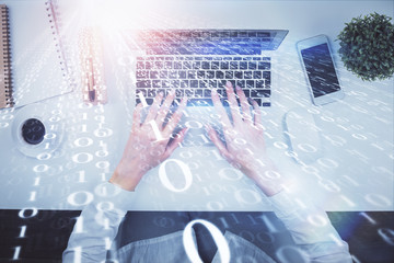 Double exposure of woman hands working on computer and data theme hologram drawing. Top View. Technology concept.