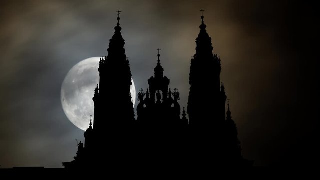 Cathedral of Santiago de Compostela in Spain, Famous for the Catholic Pilgrimage route, Time Lapse by Night with Full Moon .