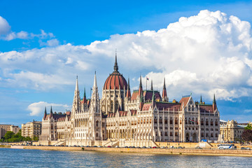 Obraz premium Building of the Hungarian National Parliament in Budapest, Hungary. Notable landmark of Hungary, and a popular tourist destination in Budapest. Designed in neo-Gothic style