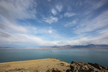 Fototapeta na wymiar Cloudy view on a mountain lake. Mongolia