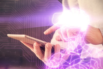 Fototapeta premium Double exposure of man's hands holding and using a digital device and AR glasses drawing. Virtual reality concept.