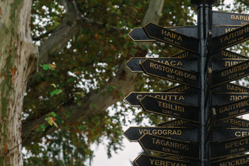 metal direction signs to cities of the world in the city of Odessa