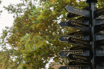 metal direction signs to cities of the world in the city of Odessa