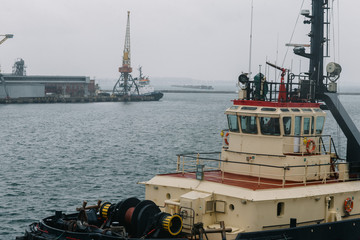 Ship tug docked at the shore of Odessa Sea Port