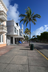 Fototapeta na wymiar Miami Beach, Florida - March 21, 2020 - Ocean Drive appears empty as hotels, restaurants and beach ordered closed due to coronavirus pandemic.