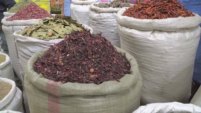 Egyptian market in Cairo, Egypt. Close up video of colorful spices, teas and herbs.