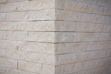 brick wall made from natural rock.