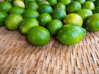 ​Organic lemons rugged green skin.