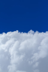 Gray dense clouds There is a dark blue background.