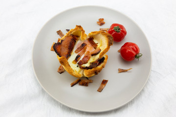 Toast bread with cheese, bacon and egg