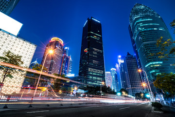 Fototapeta na wymiar Office building and street night view in Lujiazui Financial District, Shanghai..