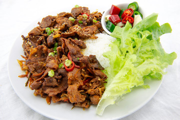Stir fried with pork and vegetables sprinkle sesame seeds