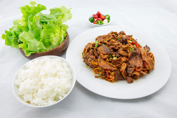 Stir fried with pork and vegetables sprinkle sesame seeds