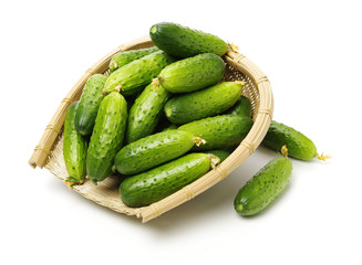 Green cucumber on the white background