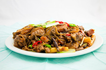Korean chicken stew with soy sauce, glass noodle, rice cake and vegetables