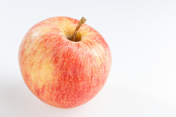 Red apple fruit on white background
