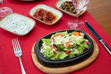 Spring salad from early vegetables,