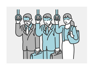 	通勤中疲れた顔をするビジネスパーソン