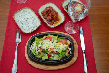 Spring salad from early vegetables,