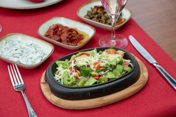 Spring salad from early vegetables,