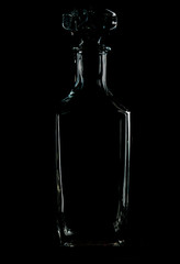 Decanter on black backdrop, smooth, dark