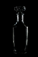 Decanter on black background, contrast, bright