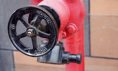 Closeup of wheel valve of industrial fire fighting system