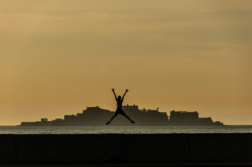 silhouette of windmill at sunset
