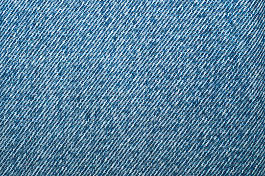 Jeans texture close up. blue denim background