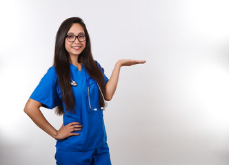 Nurse in Glasses Holds Hand Up