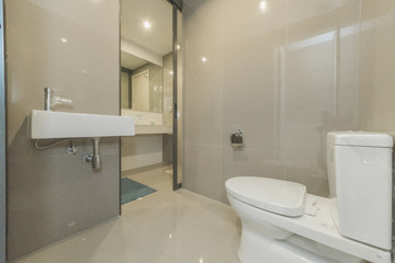 white toilet clean and simple bathroom