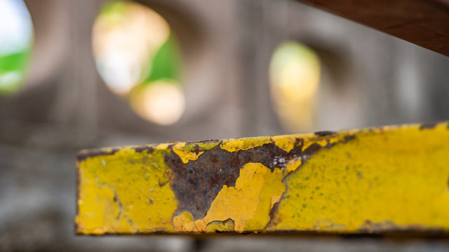close up rusty steel texture. piant yellow, texture background,