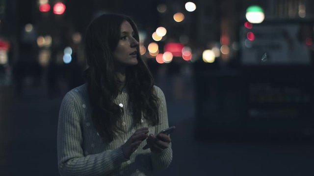 Young adult woman on mobile in New York