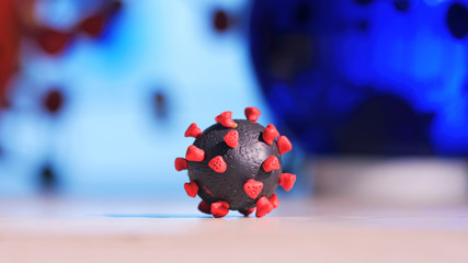 Plasticine Coronavirus Bacteria Model. Photo of COVID 19 cell bacteria clay model. How to treat Coronavirus, ncov.
