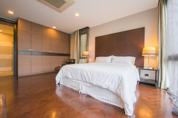 Fototapeta premium Bright Interior of cozy bedroom in modern design