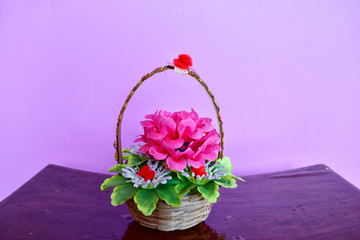 Fototapeta na wymiar A colorful artificial flower basket